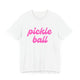 White pickleball t-shirt with a pink script Pickle Ball text design