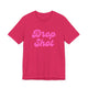Fuchsia pickleball t-shirt with a pink script Drop Shot text design
