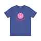 Heather True Royal pickleball t-shirt with a pink smiley face graphic over "Pickleball" text