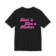 Black pickleball t-shirt with a pink script Dink it Like a Mother text design