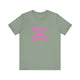 Sage pickleball t-shirt with a pink script What's the Score text design
