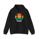 Black pickleball hoodie with a retro sunset circle with silhouetted palm trees and "West Coast Pickleball" script text