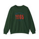 Forest Green pickleball crewneck sweatshirt with a distressed collegiate-style "Bainbridge Island 1965 WA" text stack in navy and coral