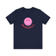 Navy pickleball t-shirt with a pink smiley face graphic over "Pickleball" text