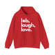 Red pickleball hoodie with a lob, laugh, love text design and pickleball icon