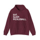 Maroon hoodie with Eat. Sleep. Pickleball. text design